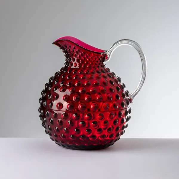 1.5-litre ruby-coloured acrylic jug, ‘Gene Krupa’ by Mario Luca Giusti