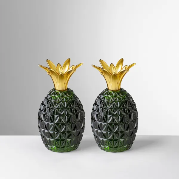 Caterina and Vittoria pineapple-shaped salt and green pepper set by Mario Luca Giusti
