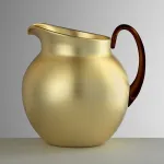1.4-litre gold-coloured acrylic jug, ‘Plutone’, by Mario Luca Giusti